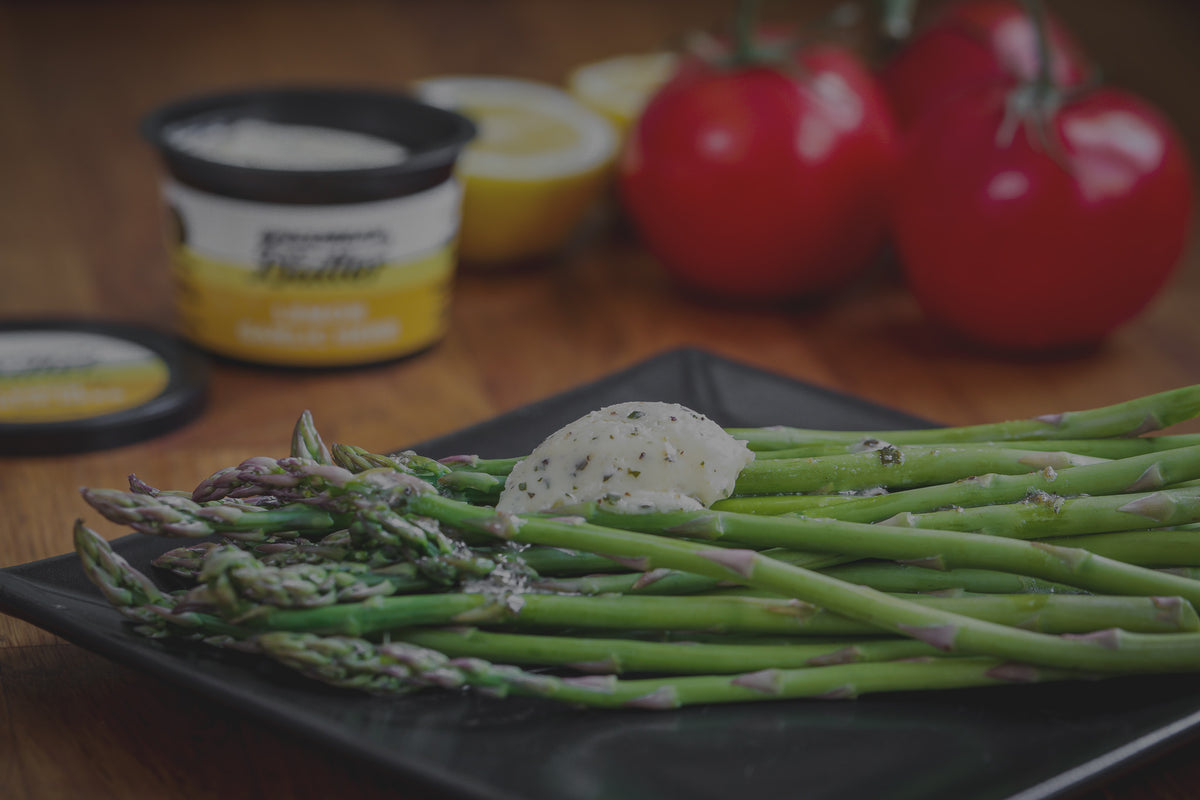 Asparagus finished with Epicurean Butter Lemon Garlic Herb Flavored Butter